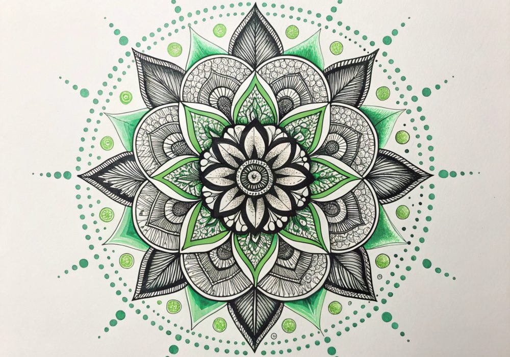 Intricate Hand Drawn Mandala Showcasing Symmetry and Depth With Vibrant Green Accents